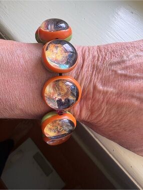 Handmade Orange & Green Dome Bracelet featuring a kitty in each bead